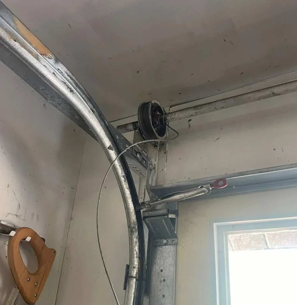 Broken Garage Door Cable Replacement - Infinity Garage Door